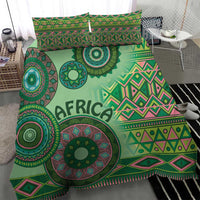 Green tribal bedding set duvet with large circular designs and geometric accents