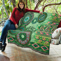 Green tribal quilt with large circular mandalas, zigzag stripes, and "AFRICA" text