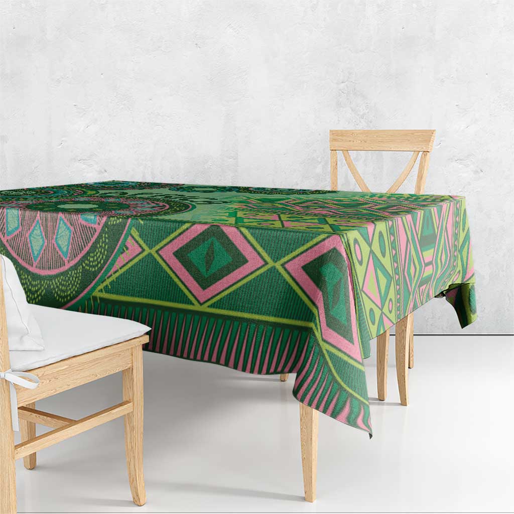 Green tribal geometric tablecloth with diamond and wave motifs, decorative fringe hem