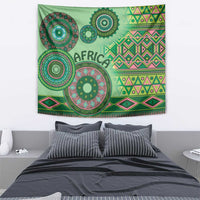 Green tribal tapestry with large mandala circles and 'AFRICA' text
