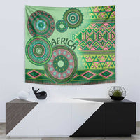 Green tribal tapestry with diamond patterns, large mandala, and 'AFRICA' lettering