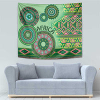 Green tribal tapestry with layered circular designs and 'AFRICA' lettering