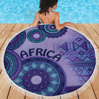 Purple round beach blanket with tribal mandala and geometric pattern, white fringe trim