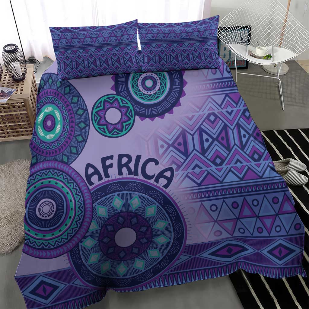 Purple bedding set with bold African tribal circular motif and matching pillowcases