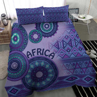 Purple bedding set with bold African tribal circular motif and matching pillowcases