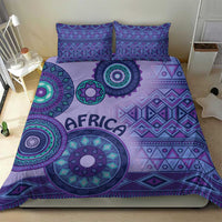 Purple bedding set with African tribal pattern circles, “AFRICA” lettering, and pillowcases