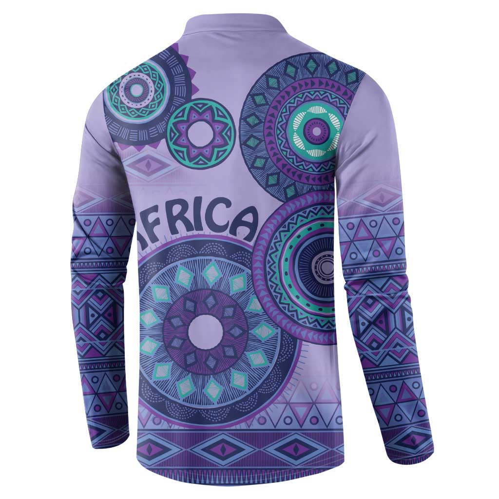 Purple henley sweatshirt back with teal tribal circular motifs and patterned sleeves
