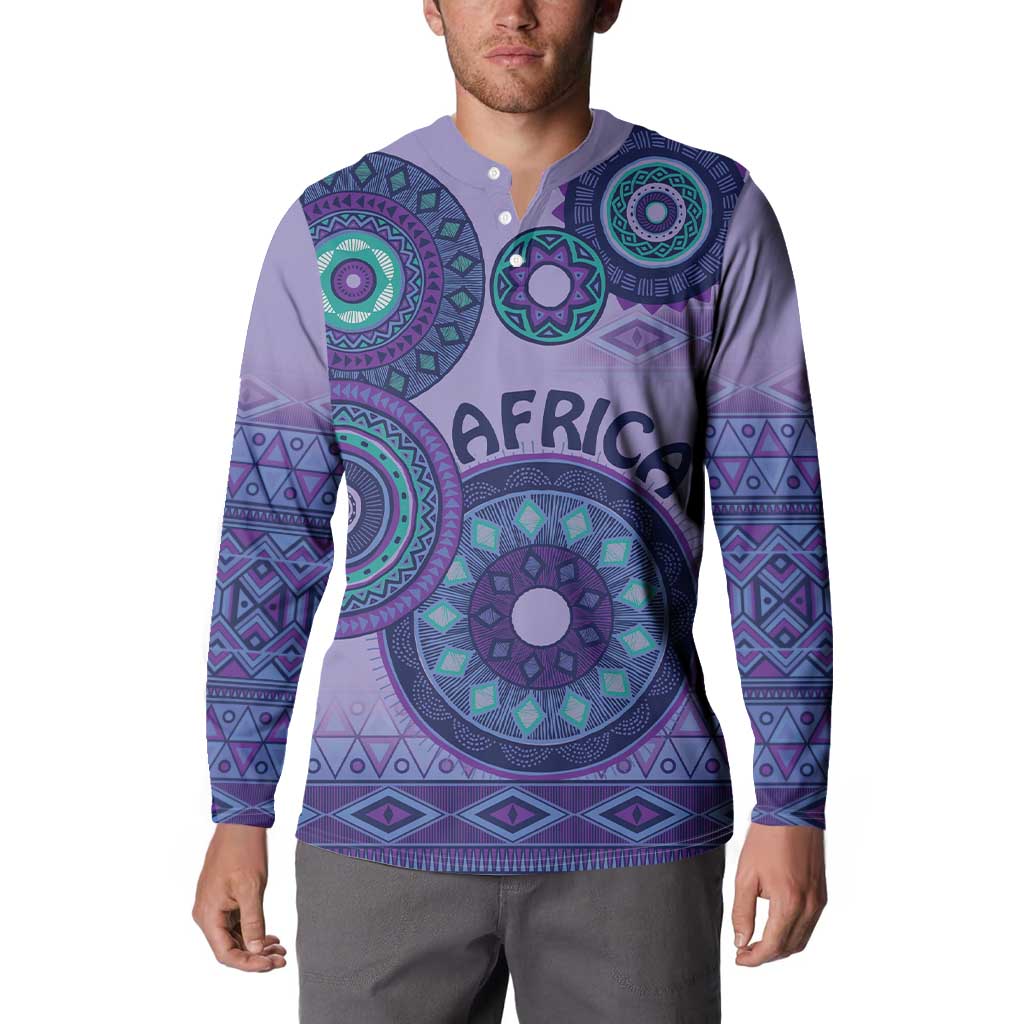 Purple henley sweatshirt on model, long sleeves with teal tribal pattern and 'AFRICA' text