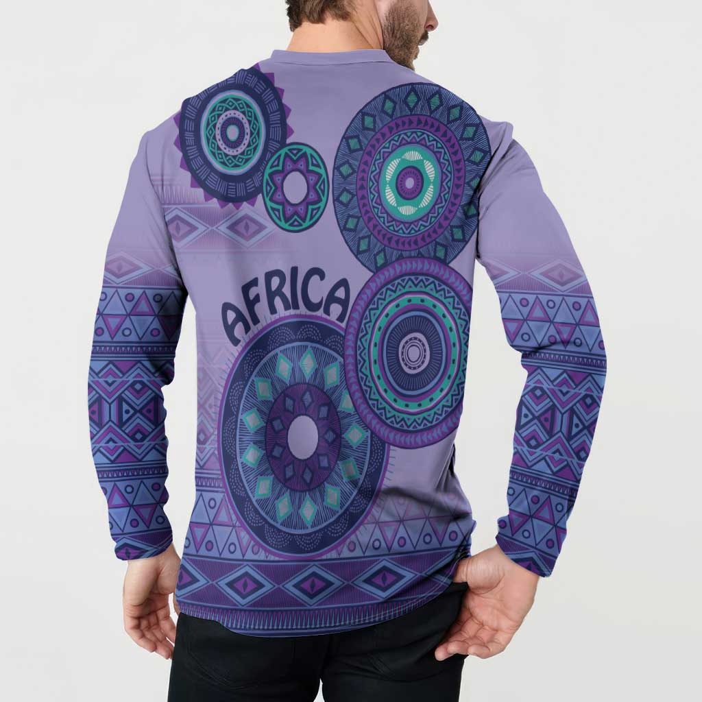 Purple henley sweatshirt back on model with teal tribal circular motifs and patterned sleeves
