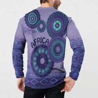 Purple henley sweatshirt back on model with teal tribal circular motifs and patterned sleeves