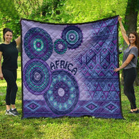 Purple tribal quilt featuring teal circular designs, zigzag patterns, and "AFRICA"