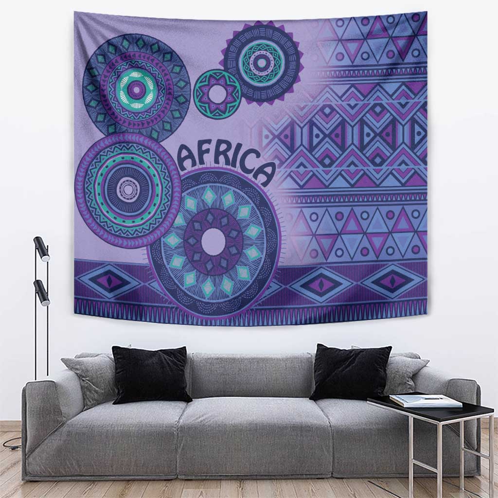 Purple African tribal tapestry with circular motifs in teal and pink tones