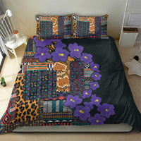 Dark bedding set with multicolor tribal pattern, leopard strip, purple flowers, and 2 pillows