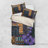 Dark bedding set with tribal patchwork design, leopard accents, purple flower print, 2 pillows