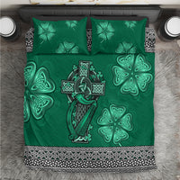 Green bedding set with Celtic cross, harp, shamrock motifs, and patterned border trim.