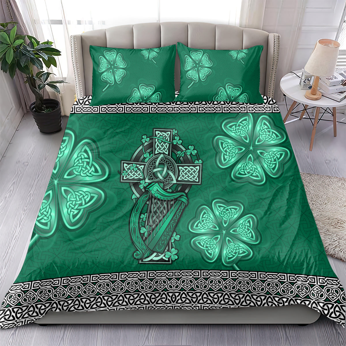 Green duvet and pillow set with Celtic cross-and-harp centerpiece, shamrocks, black trim.