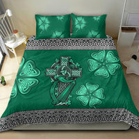 Green Celtic bedding set featuring cross-and-harp design, shamrock accents, decorative border.