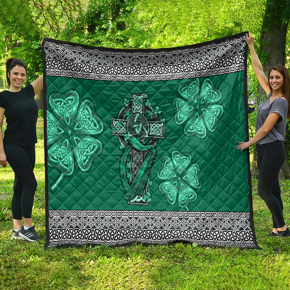 Green personalized quilt featuring Celtic cross, harp, and shamrock motifs with white geometric border.