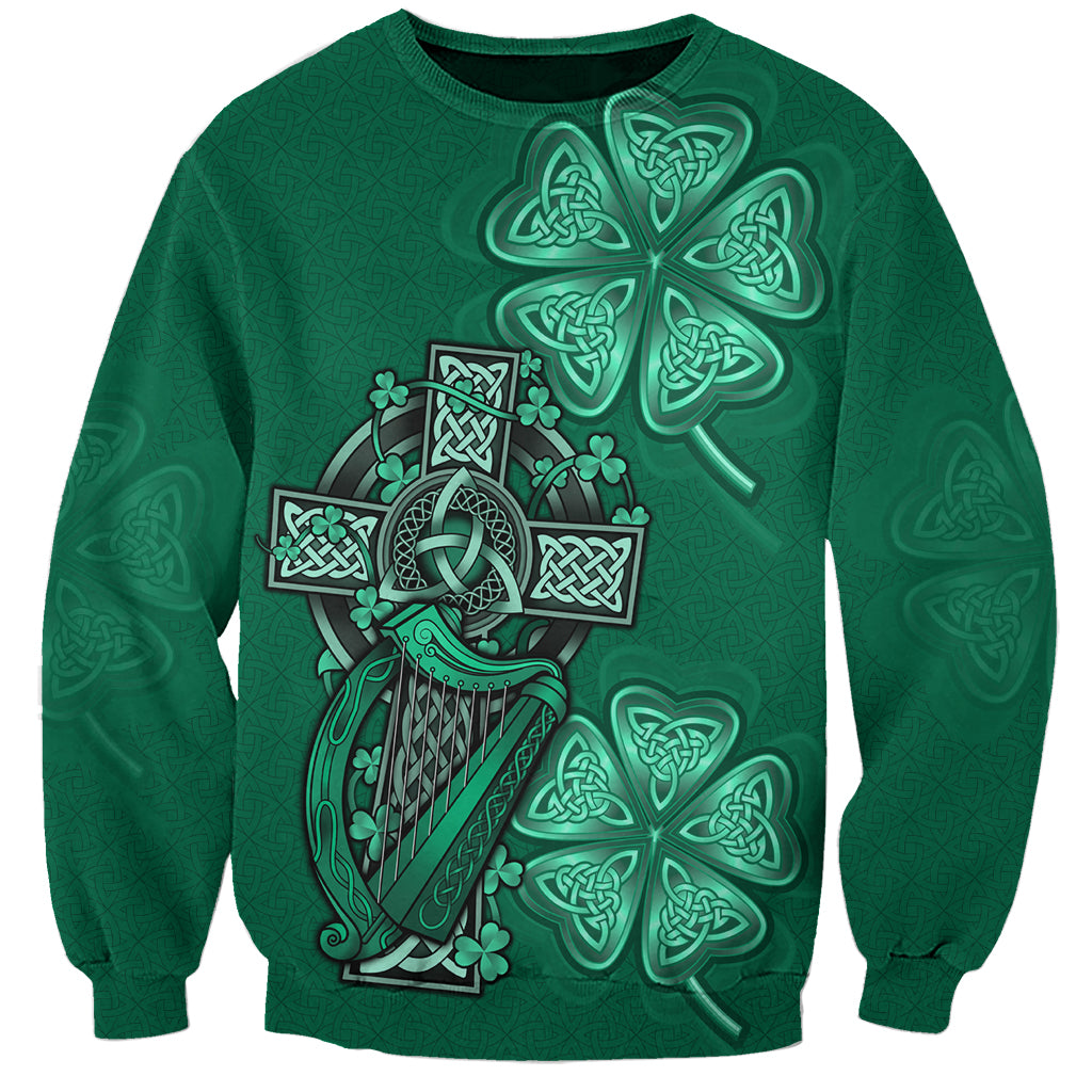 Green sweatshirt with teal Celtic cross and harp knotwork graphic