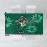 Green Celtic-inspired tablecloth with cross, harp, and shamrock decorative design border
