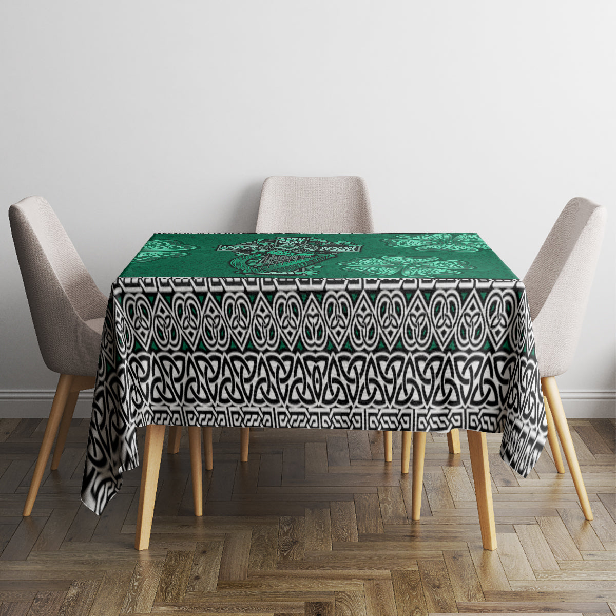 Green dining tablecloth featuring Celtic motifs: cross, harp, shamrock with patterned trim