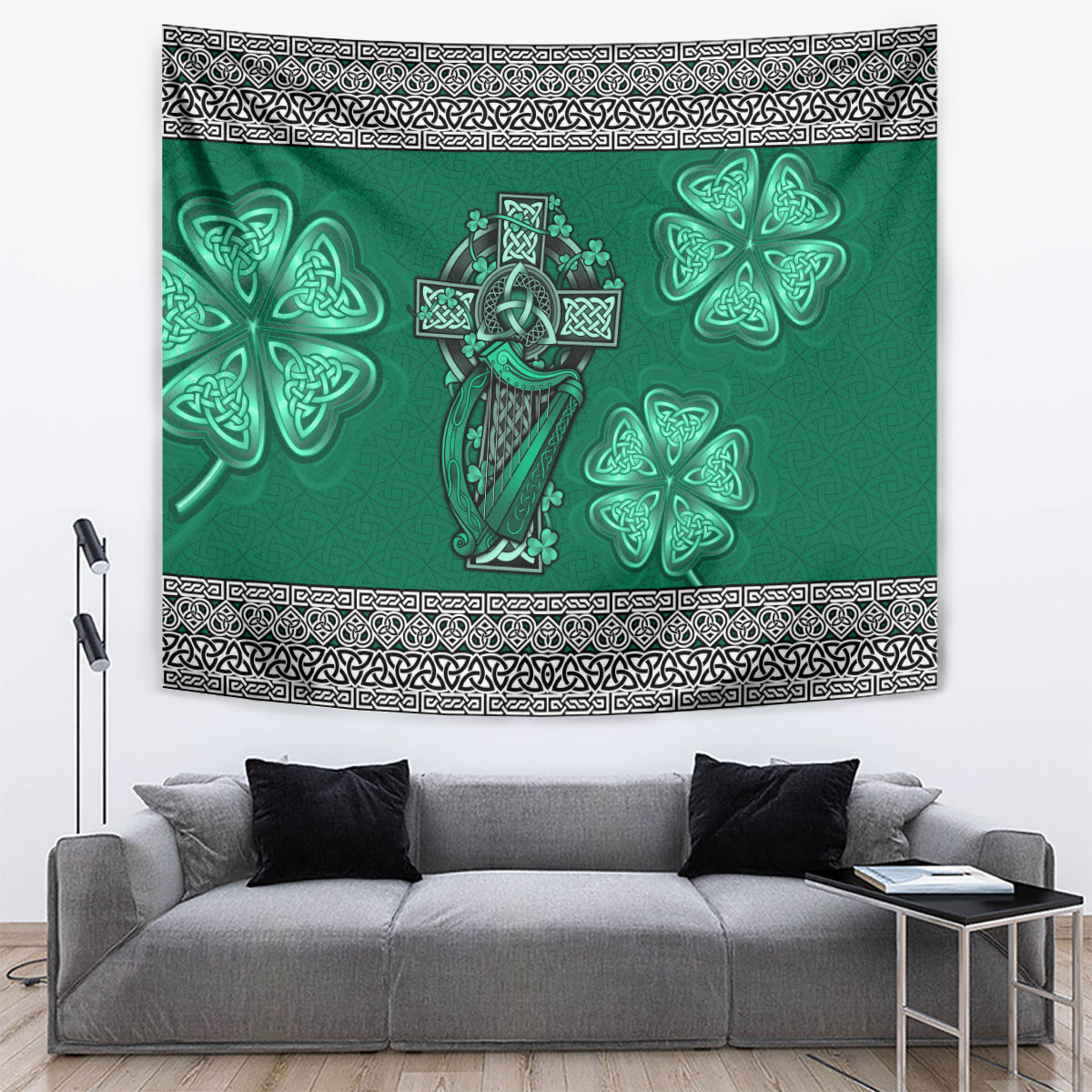 Green tapestry with central Celtic cross-and-harp and shamrock clover shapes, framed by trim