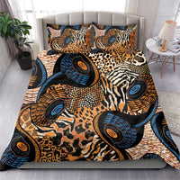 Bedding set featuring leopard and zebra patterns in blue, orange, and black with two pillows
