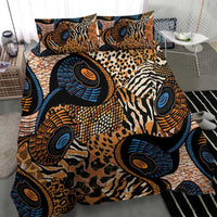 Bedding set with zebra and leopard prints in blue, orange, and black; includes two pillowcases