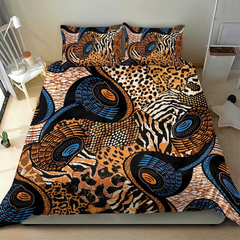 Bedding set on bed with zebra and leopard animal motifs in blue, orange, and black