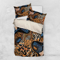 Flat-lay bedding set with animal motif duvet and two pillowcases in blue, orange, and black