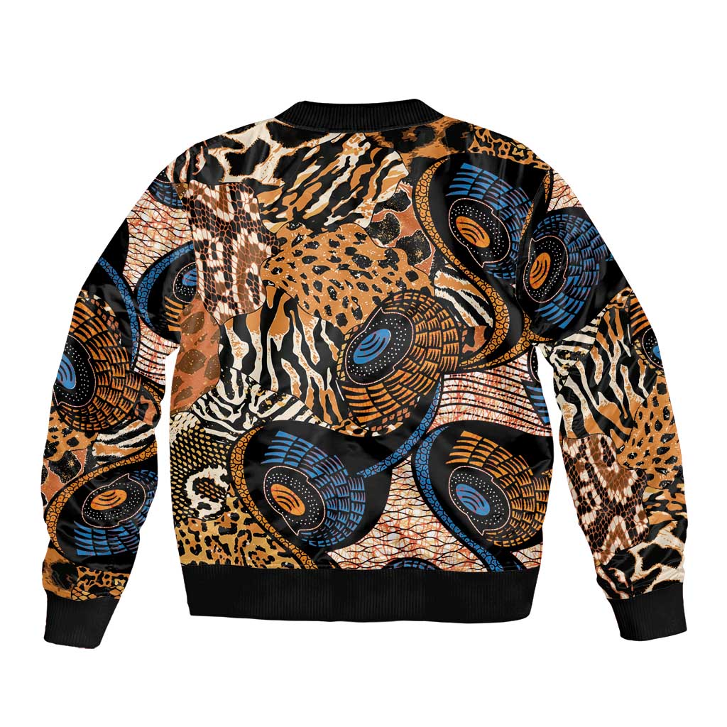 Unisex bomber jacket with black ribbed hem and all-over patchwork animal skin prints, back view