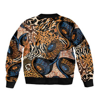 Unisex bomber jacket with black ribbed hem and all-over patchwork animal skin prints, back view