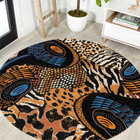 Round decorative rug with black, orange, and blue animal print and circular motifs