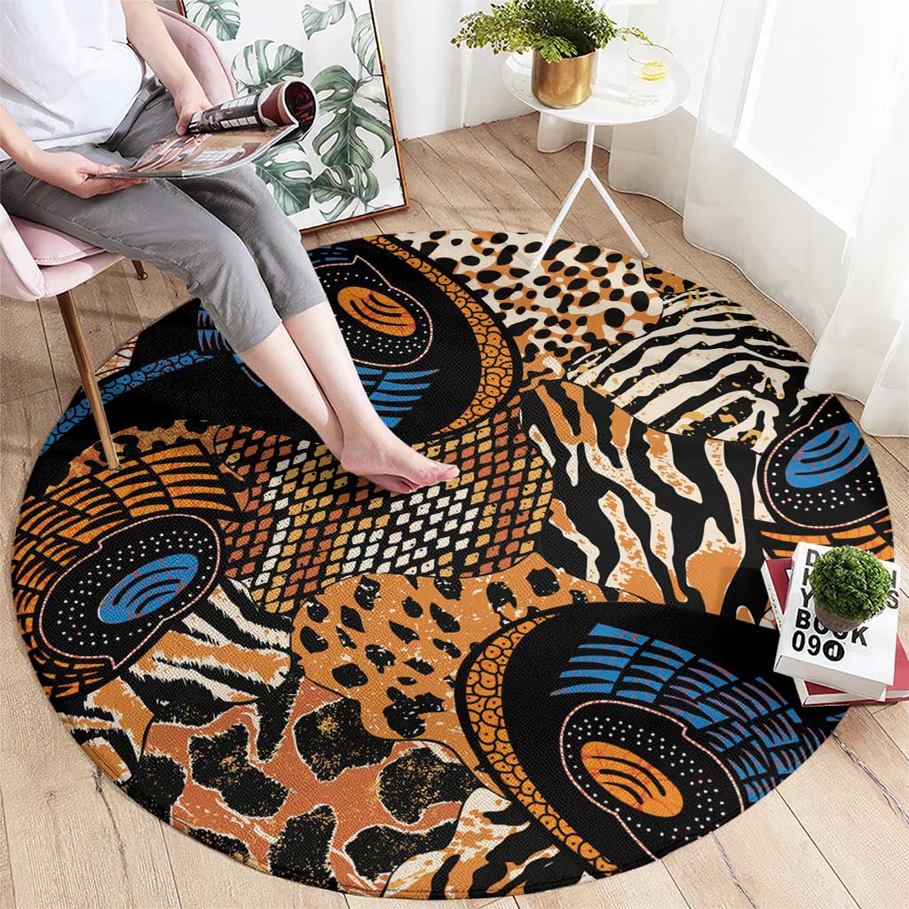 Round animal-pattern rug with bold blue and orange accents and zebra-like stripes