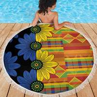 150cm round beach blanket over deck, black base with blue yellow flower and kente patch pattern