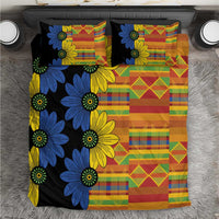 Black kitenge-style duvet cover with blue and yellow flower print and multicolor patchwork