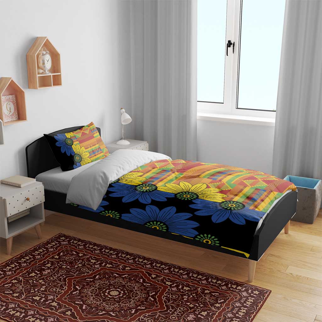 Black duvet cover with blue and yellow flower design and colorful patchwork detail