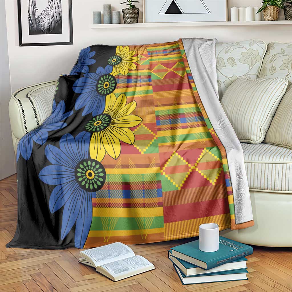 Floral kitenge-style blanket with blue and yellow flowers and multicolor plaid pattern