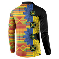 Black long-sleeve button sweatshirt with blue and yellow floral kitenge panel on back