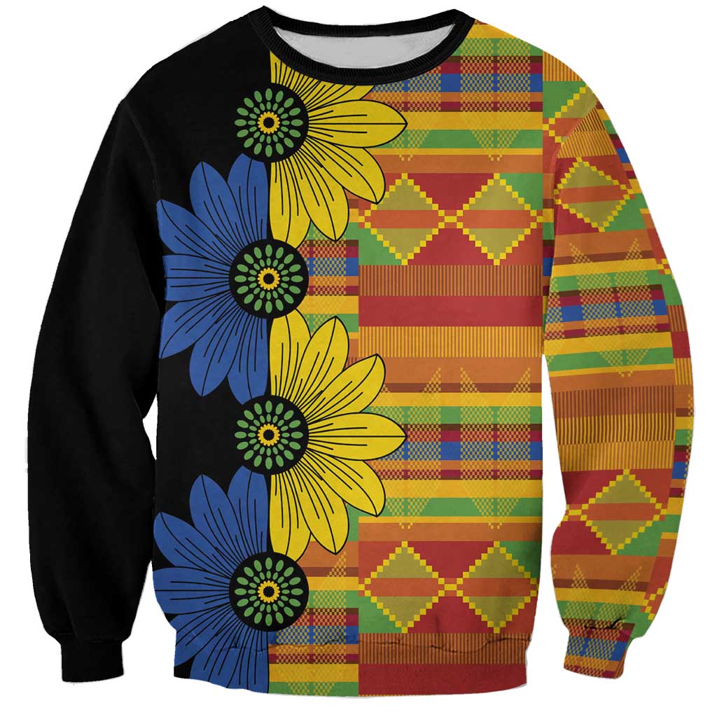 Unisex sweatshirt in black with colorful kitenge patchwork and large floral print
