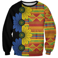 Unisex sweatshirt in black with colorful kitenge patchwork and large floral print