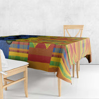 Kitenge-style tablecloth draped over table, multicolor plaid and geometric bands