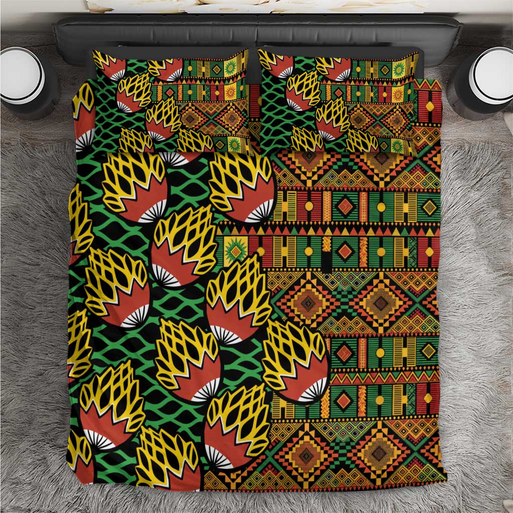 Geometric kanga bedding set with green, orange, yellow and black leaf patterns