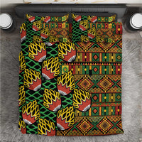 Geometric kanga bedding set with green, orange, yellow and black leaf patterns