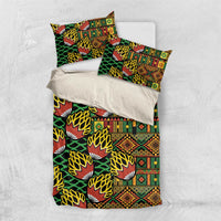 Kanga bedding set with duvet cover and two pillowcases, green and orange tribal pattern