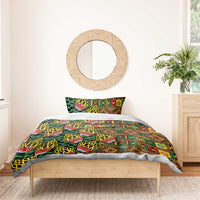 Kanga bedding set with green, orange and yellow geometric leaf pattern on duvet cover