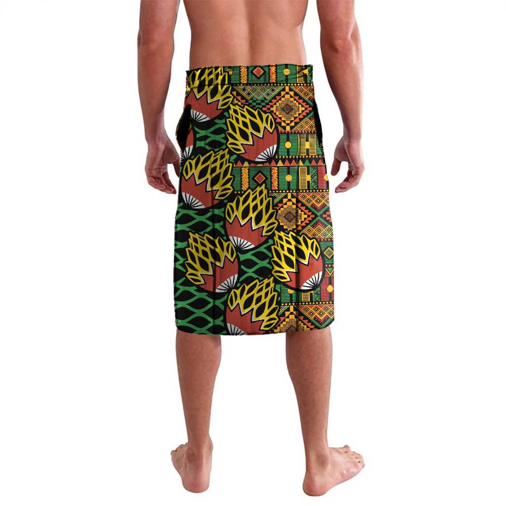 Knee-length lavalava wrap skirt with black base, green yellow and maroon geometric kanga print