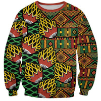 Unisex crewneck sweatshirt in bold African geometric kanga-style print, long sleeves.