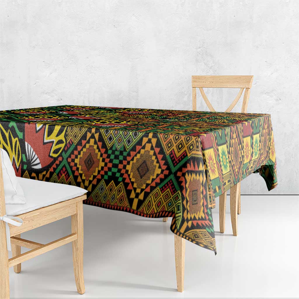 African tribal geometric kanga tablecloth over bench, patterned border and diamonds
