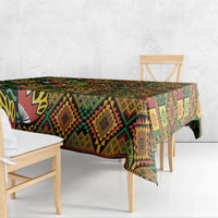 African tribal geometric kanga tablecloth over bench, patterned border and diamonds